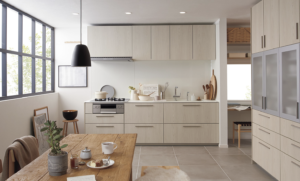 扉シュリオーク×ワークトップクリスタルスノーのレイアウト事例画像_TOTOザクラッソカタログより_壁づけキッチン